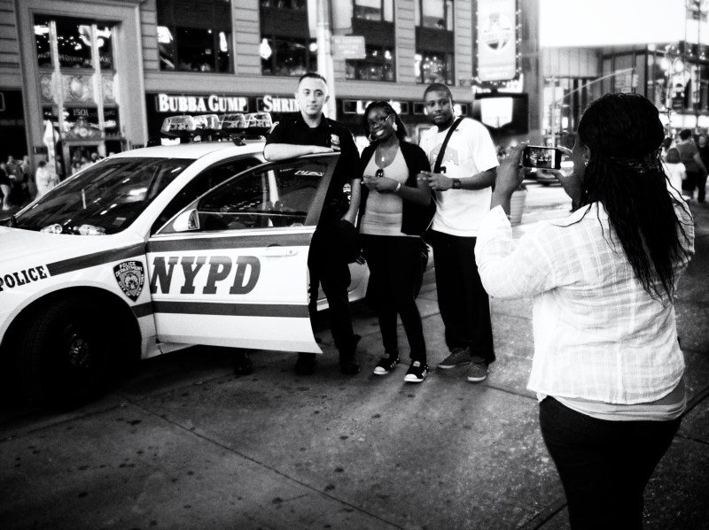 NYPD Cop in Times Square with Tourists