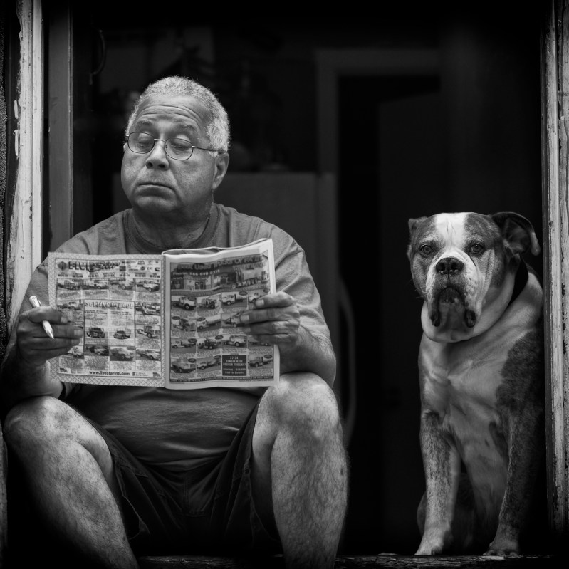 Man and Dog sitting on Doorstep