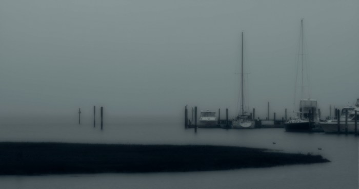 Boats in misty morning weather
