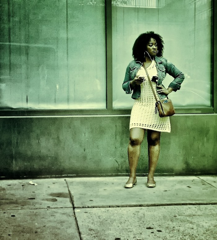 Black woman waiting for the bus