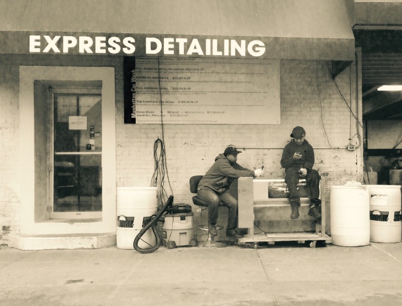 two guys on their cellphones