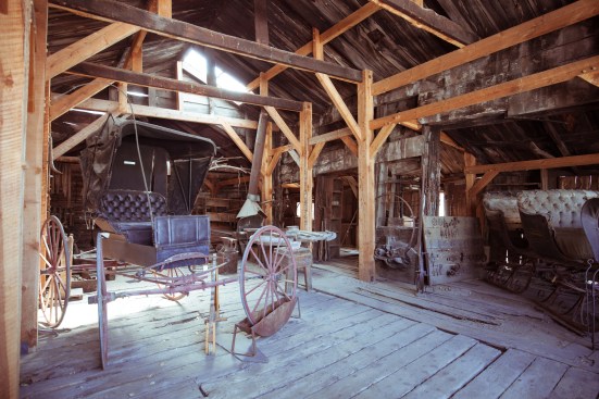 old-fashioned coaches in garage