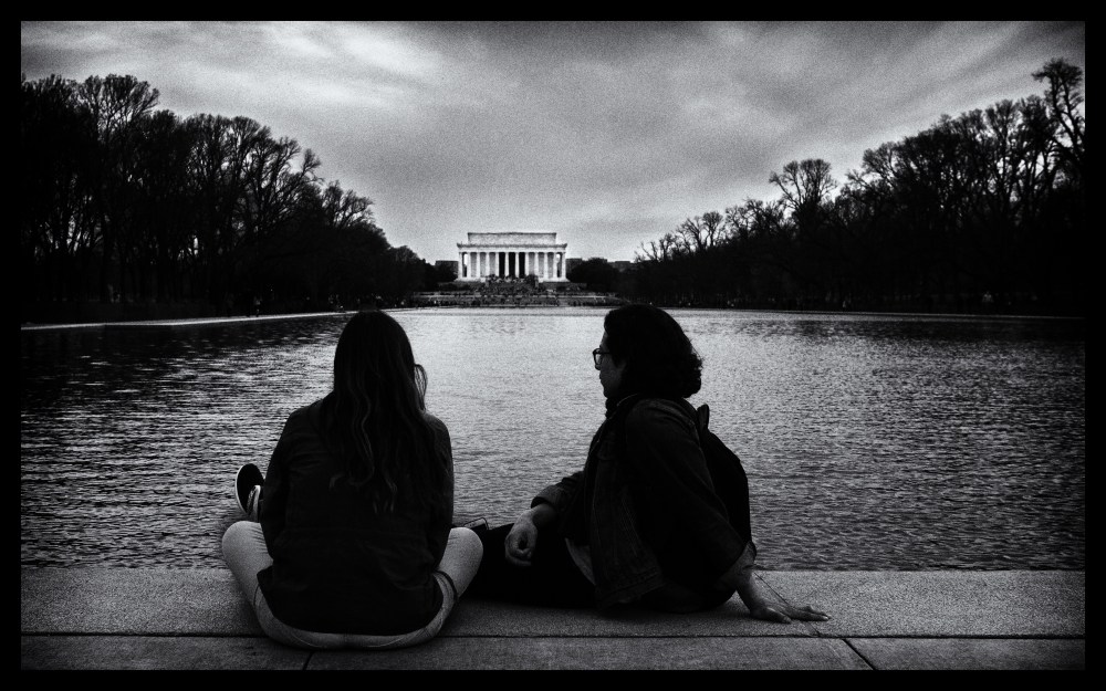 couple looking at Lincoln Memorial